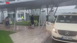 冷清寂静!世界杯意外止步32强,德国队在倾盆大雨中抵达慕尼黑